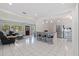 Open concept home with living room leading to kitchen and dining area at 8200 31St N Ter, St Petersburg, FL 33710