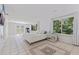 Spacious main bedroom with large windows overlooking the lush backyard at 8200 31St N Ter, St Petersburg, FL 33710