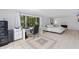 Large main bedroom featuring an office area, fireplace, and large windows at 8200 31St N Ter, St Petersburg, FL 33710