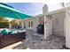 Enjoy the outdoor patio area with comfortable seating, an outdoor shower, and a built-in grill at 8200 31St N Ter, St Petersburg, FL 33710
