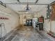 Spacious garage with laundry area and storage, offering ample room for parking and projects at 8336 Monaco Dr # A, Port Richey, FL 34668