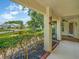 Inviting covered patio with decorative elements and lush landscaping, offering a serene outdoor space at 8336 Monaco Dr # A, Port Richey, FL 34668