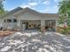 Spacious three car garage with open doors and plenty of room for vehicles and storage at 8711 Crescent Forest Blvd, New Port Richey, FL 34654