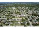 This is an aerial view of the neighborhood, showcasing the area's layout, mature trees, and proximity to amenities at 8848 56Th N Way, Pinellas Park, FL 33782