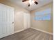This bedroom features neutral paint and ample natural light from the window at 8848 56Th N Way, Pinellas Park, FL 33782