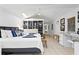 Bright primary bedroom featuring built-in shelving and plenty of natural light at 20060 Gulf Blvd, Indian Shores, FL 33785