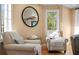 Relaxing sitting room with comfortable seating, natural light, and tasteful decor, offering a cozy retreat at 20060 Gulf Blvd, Indian Shores, FL 33785