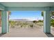 Breathtaking beach view from the covered patio, with serene ocean waters at 20060 Gulf Blvd, Indian Shores, FL 33785