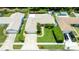 Bird's-eye view of a home with a beautiful backyard, well-kept lawn, and surrounding landscape at 11116 118Th St, Seminole, FL 33778