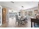 Bright dining room featuring a modern light fixture and doorway to the living room at 11116 118Th St, Seminole, FL 33778