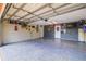 Clean garage boasting epoxy floors, ample storage, and a well-organized workspace at 11116 118Th St, Seminole, FL 33778