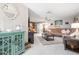 Spacious living room with tile flooring, a comfortable brown sofa, and modern decor at 11116 118Th St, Seminole, FL 33778