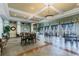 Spacious clubhouse seating area featuring comfortable furniture and plenty of natural light at 11125 Shelter Cove Loop, New Port Richey, FL 34654