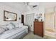 Cozy bedroom with a daybed, neutral decor, and a ceiling fan for added comfort at 1136 Thayer St, Safety Harbor, FL 34695