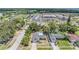Beautiful home with a backyard pool, lush landscaping, and a serene residential neighborhood setting at 1403 Tallahassee Dr, Tarpon Springs, FL 34689