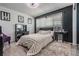 Serene bedroom featuring contemporary decor, soft lighting, and cozy carpet, creating a peaceful retreat at 1403 Tallahassee Dr, Tarpon Springs, FL 34689