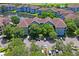 Apartment community with lush landscaping, parking, and a serene pond that is great for relaxation and enjoyment at 1640 Villa Capri Cir # 206, Odessa, FL 33556