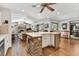 Open floor plan connecting the kitchen, living room, and dining area for easy entertaining at 1810 Tamerlane Pl, Brandon, FL 33510