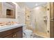 Bathroom features stylish glass shower, modern vanity, and sleek fixtures, offering a spa-like experience at 2020 Greenwood Valley Dr, Plant City, FL 33563