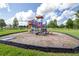 Community playground with slides and climbing structures, offering a fun outdoor activity space for children at 2020 Greenwood Valley Dr, Plant City, FL 33563