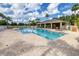 Community swimming pool with lounge seating for residents at 2020 Greenwood Valley Dr, Plant City, FL 33563