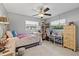 Cozy bedroom features plenty of space and natural light from two windows at 2850 Doone Cir, Palm Harbor, FL 34684