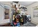 Well-equipped laundry room with modern washer, dryer, and ample storage shelves at 2850 Doone Cir, Palm Harbor, FL 34684
