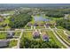 Overhead shot highlighting property's location in a serene community near a pond and lush greenery at 2903 Cordoba Ranch Blvd, Lutz, FL 33559