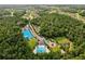 Panoramic aerial view of a Gathering-friendly community featuring a pool, playground and sports courts at 2903 Cordoba Ranch Blvd, Lutz, FL 33559
