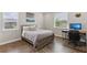 Bedroom with a desk, chair, and neutral decor, offering a cozy and functional space at 2903 Cordoba Ranch Blvd, Lutz, FL 33559