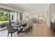 Dining room with open floor plan flows into the kitchen and living room, perfect for entertaining guests at 2903 Cordoba Ranch Blvd, Lutz, FL 33559