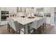Spacious kitchen with stainless steel appliances, a large island, and ample countertop space at 2903 Cordoba Ranch Blvd, Lutz, FL 33559
