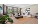 Spacious living room featuring dual sofas, neutral decor, and large windows with natural light at 2903 Cordoba Ranch Blvd, Lutz, FL 33559