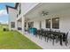Large covered patio includes ample seating and dining space, perfect for outdoor entertaining at 2903 Cordoba Ranch Blvd, Lutz, FL 33559