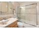 Bright bathroom featuring ceramic tile and glass enclosed tub and shower at 2960 59Th S St # 215, Gulfport, FL 33707