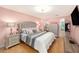 Cozy bedroom with a comfortable bed, dresser, and bedside tables, creating a relaxing and inviting space at 2960 59Th S St # 215, Gulfport, FL 33707