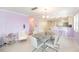 Open floor plan from the dining area to kitchen with bar seating at 2960 59Th S St # 215, Gulfport, FL 33707