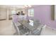 Dining area with seating and a view into the updated kitchen at 2960 59Th S St # 215, Gulfport, FL 33707