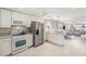 Updated kitchen with stainless steel appliances and counter seating at 2960 59Th S St # 215, Gulfport, FL 33707