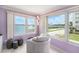 Intimate sitting area with a waterfront view and comfortable chair, perfect for relaxation and enjoying the scenery at 2960 59Th S St # 215, Gulfport, FL 33707