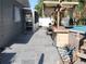 Spacious tiled patio with a tiki bar, steps to pool, and screened in room for outdoor enjoyment and relaxation at 310 4Th Ave. Southwest, Ruskin, FL 33570