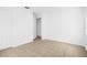 Bright bedroom features tile flooring and neutral paint at 312 E Tomlin St, Plant City, FL 33563