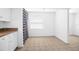 Cozy dining area with tile floors, bright natural light, and white cabinetry at 312 E Tomlin St, Plant City, FL 33563