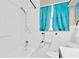 Bathroom featuring a shower and bathtub, a toilet, and a sink at 3129 W Villa Rosa St, Tampa, FL 33611