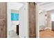 Hallway showing bathroom entrance with barn door and a bedroom entrance at 3129 W Villa Rosa St, Tampa, FL 33611