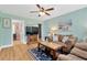 Cozy living room with comfortable seating, nautical-themed decor, and plenty of natural light at 3129 W Villa Rosa St, Tampa, FL 33611