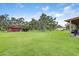Large grassy yard featuring a barn at 3515 E 34Th St, Bradenton, FL 34208