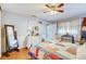 Bedroom featuring wood-look floors and ample natural light at 3515 E 34Th St, Bradenton, FL 34208
