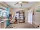 Bedroom featuring a ceiling fan, window, closet and carpet at 3515 E 34Th St, Bradenton, FL 34208