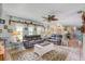 Inviting living room with ample seating, tile floors and a cozy atmosphere at 3515 E 34Th St, Bradenton, FL 34208
